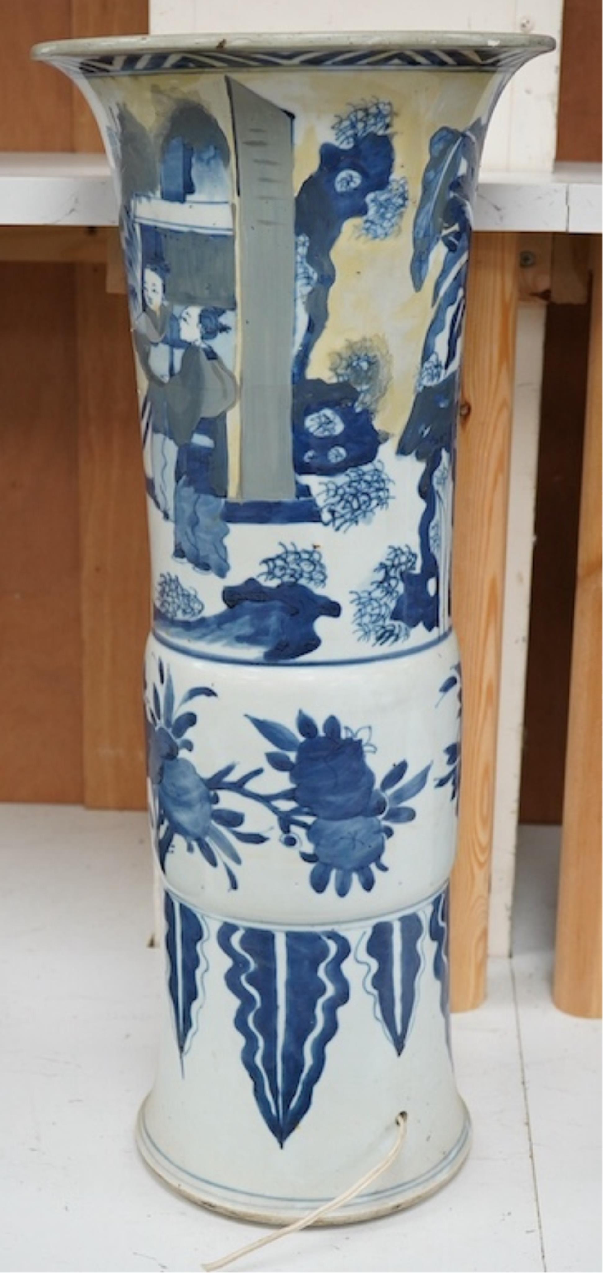 A Chinese blue and white sleeve vase. 53cm high. Condition - heavily restored.